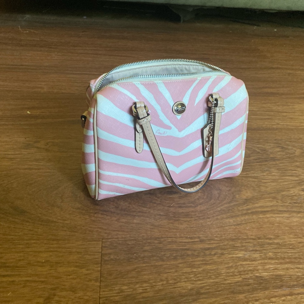 Pink and white zebra coach bag